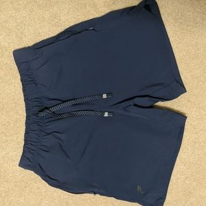Fabletics "The One" Navy shorts size Men's XS but fits like a small